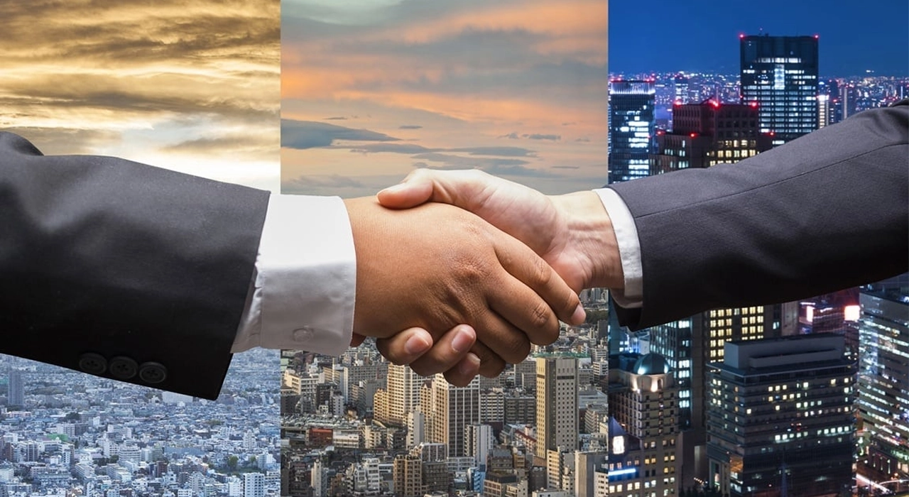 Businessmen-Handshake-Cityview